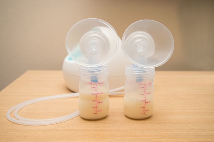 Spectra breast pump standing on the table