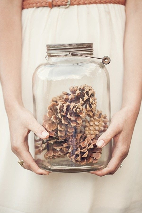 Decorating can’t get any easier than a glass jar and pinecones.