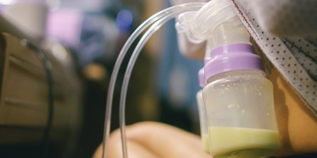 Woman pumping her breasts with breast pump