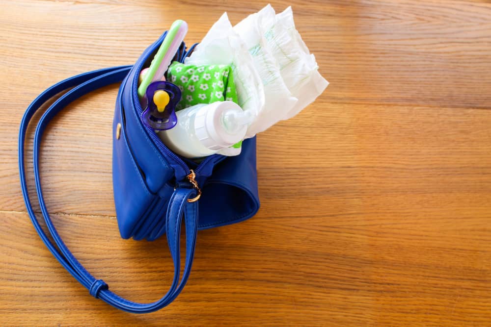 A dirty diaper bag that needs to be cleaned
