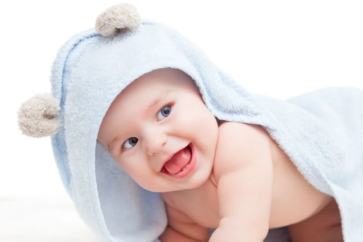 Baby wearing a towel after his bath