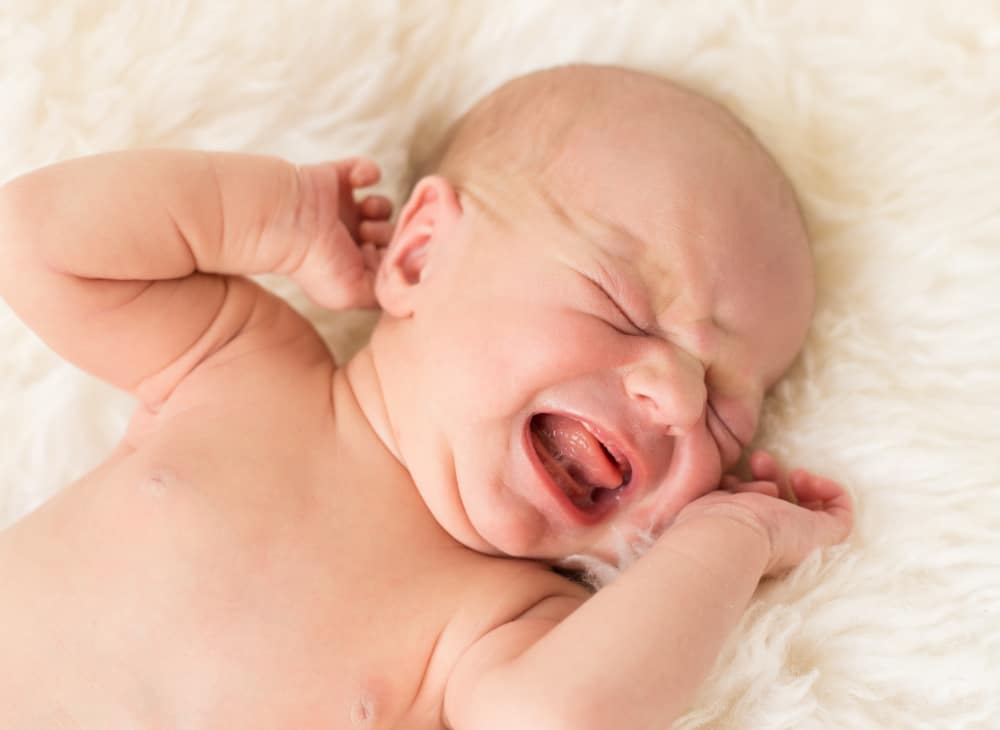 Baby crying store trying to poop