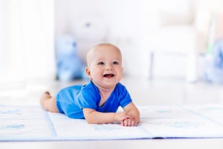 Baby sleeping on nap mat