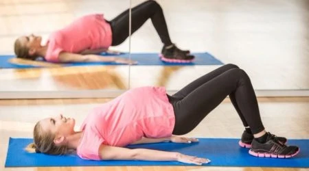 Woman exercising while pregnant