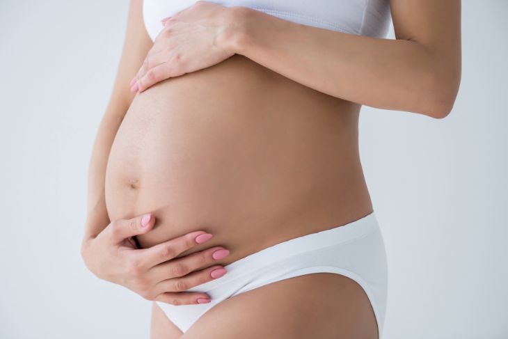 Close Up Of Woman Demonstrating Fit Legs And Breech Wearing Tight