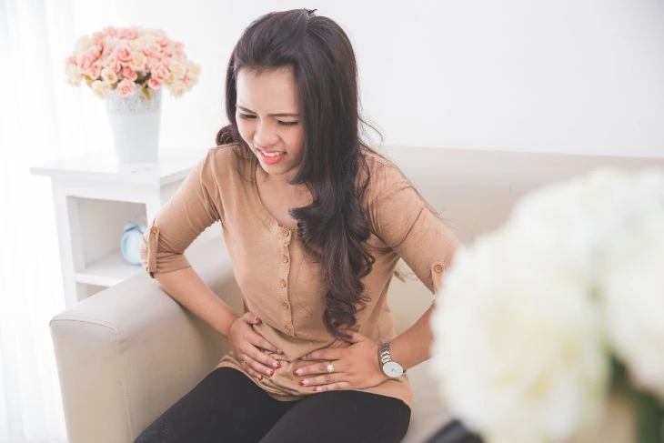 Pregnant woman suffering with diarrhea