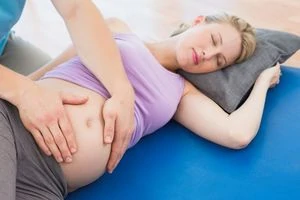 Woman getting a massage during pregnancy