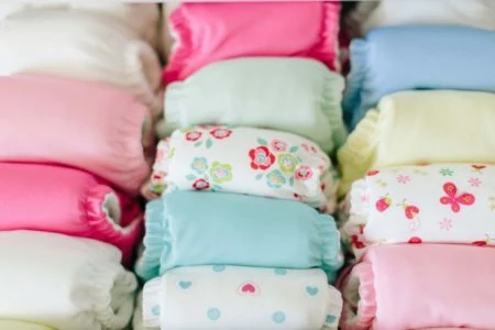Organized pile of cloth diapers