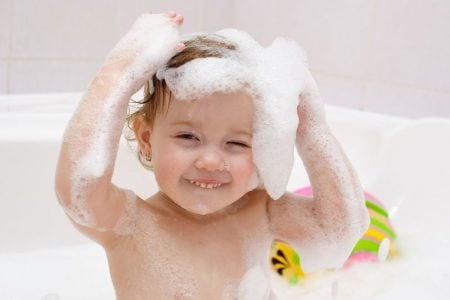 Baby taking a bubble bath