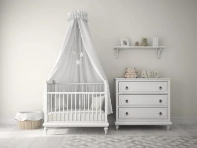 Photo of a baby nursery with a laundry hamper
