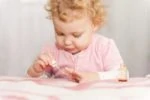 Toddler painting her nails