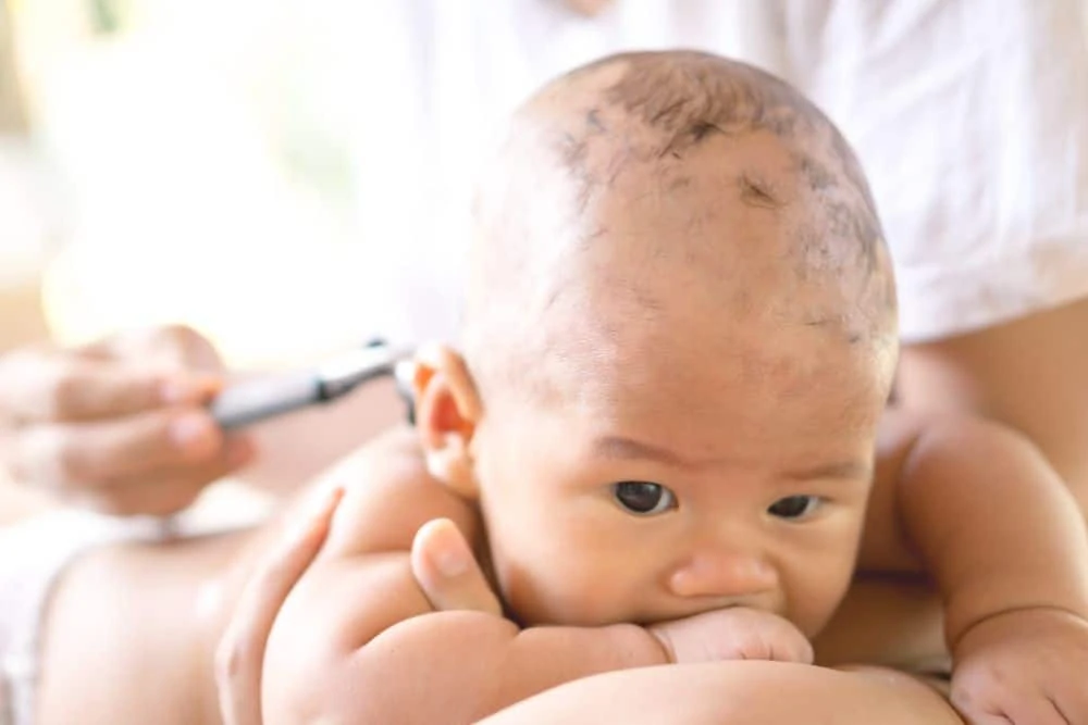 Shaving baby's hair