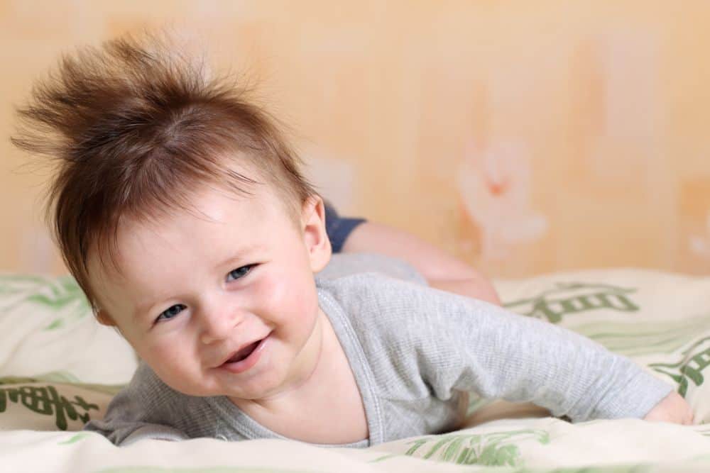 Smiling boy with mohawk