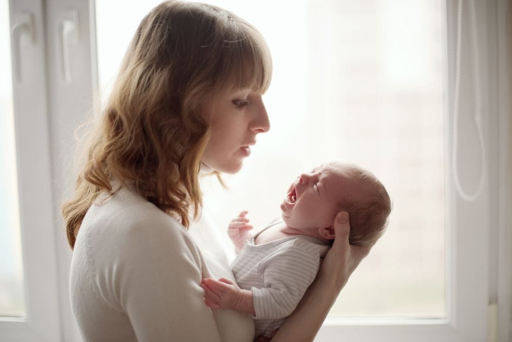 The Lowdown on Babies who Cry or Fuss While Breastfeeding