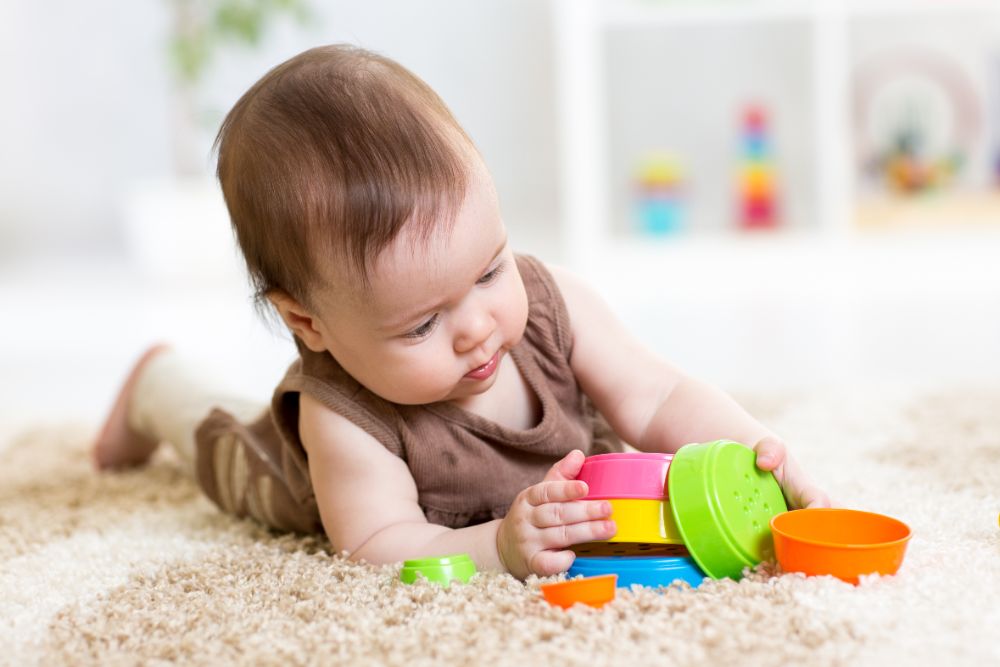 baby playing with toys