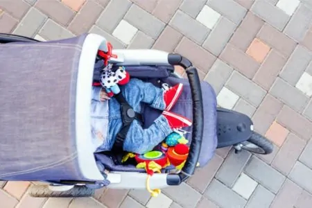 Baby sleeping in a stroller