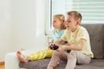 Kids playing the best PS4 games