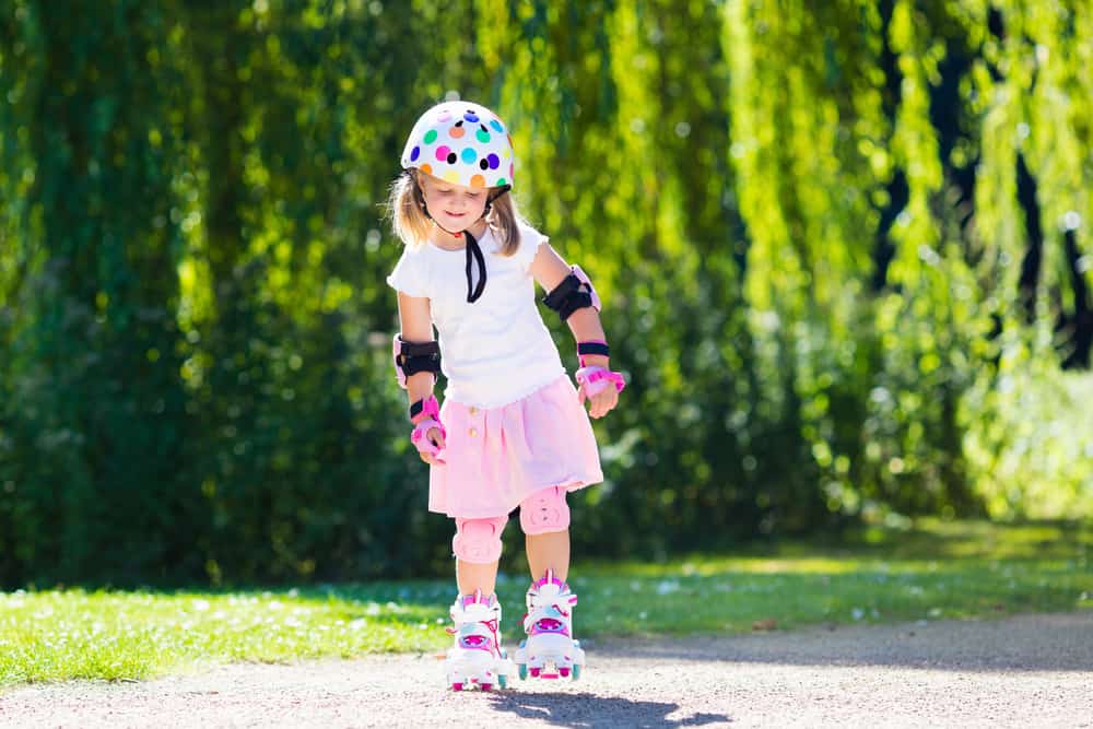 child's helmet and knee pads