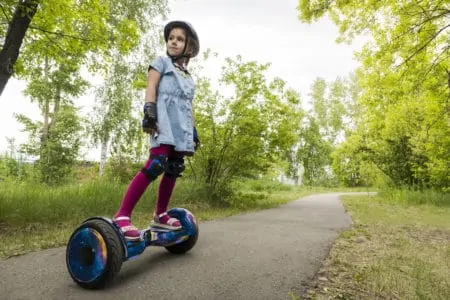 Little girl on a hoverboard