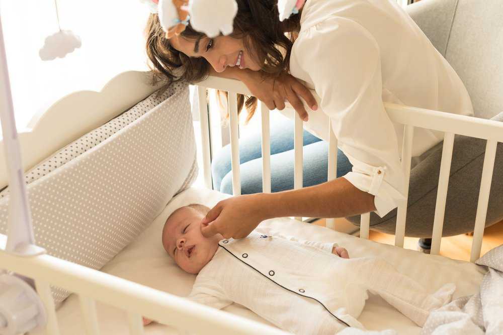 Mom sleeping with baby hotsell in crib