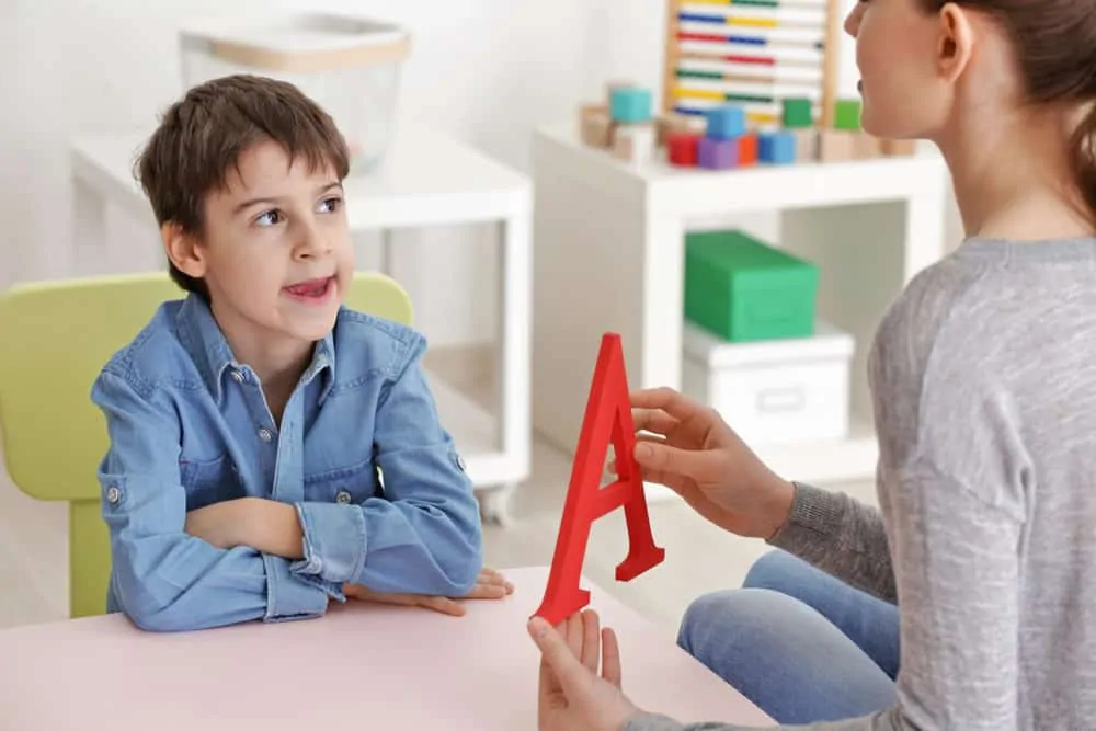 Cute little boy at speech therapy class