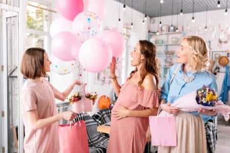 Beautiful women celebrating friend's baby shower