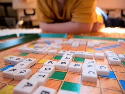 Little boy playing scrabble