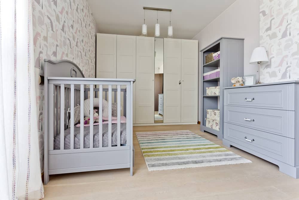 Baby nursery with matching furniture set