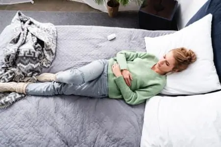 Pregnant woman struggling with morning sickness