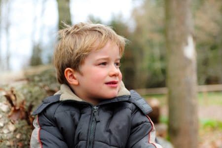 Adorable young boy in the park