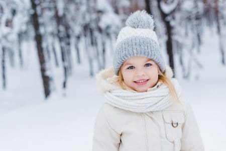 Adorable little girl in winter outfit