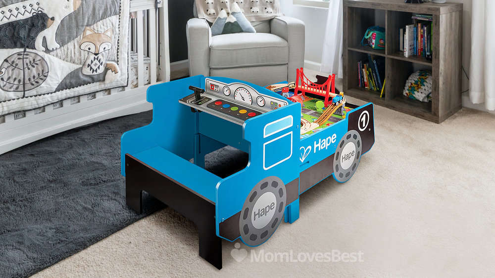 Photo of the Hape Wooden Blue Foldable Ride-on Engine
