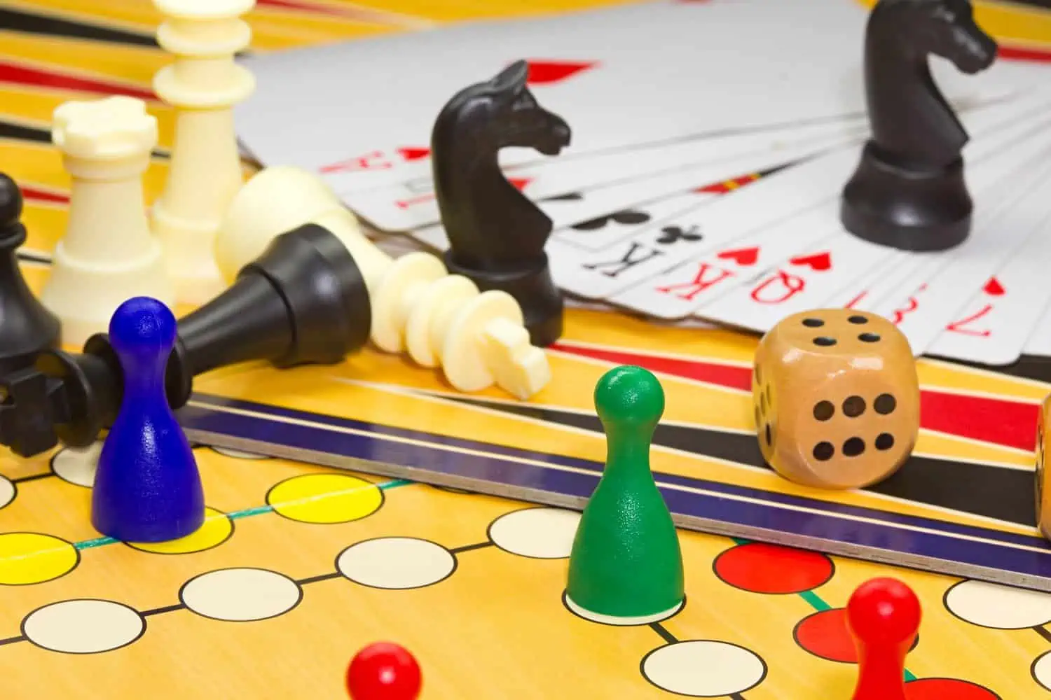 Closeup of board games such as chess and cards