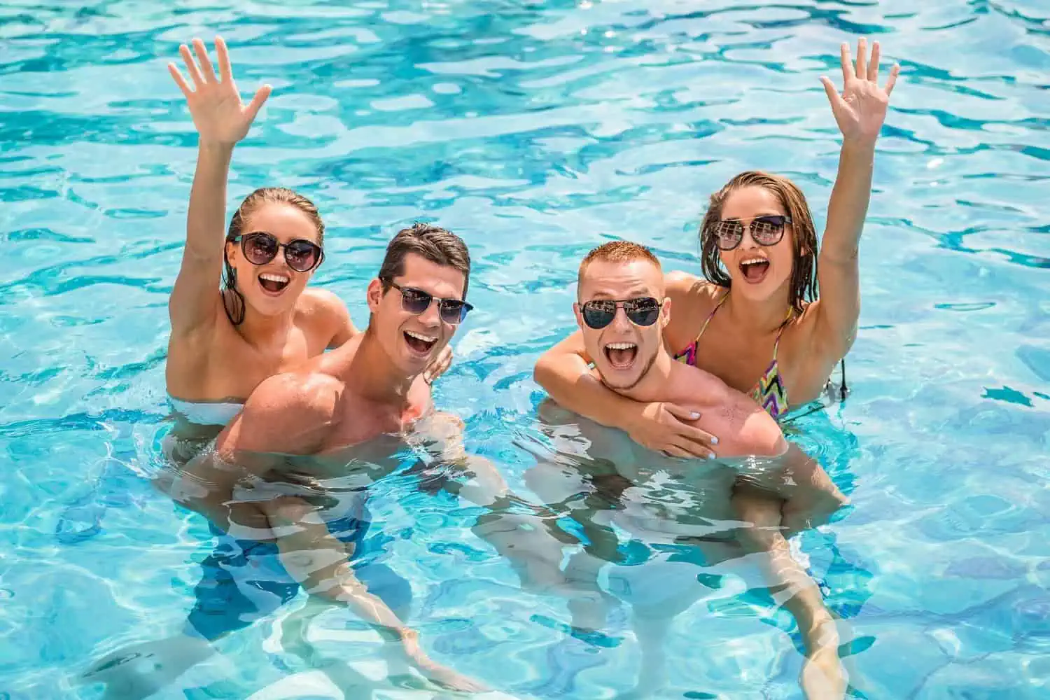 Friends having fun in the pool