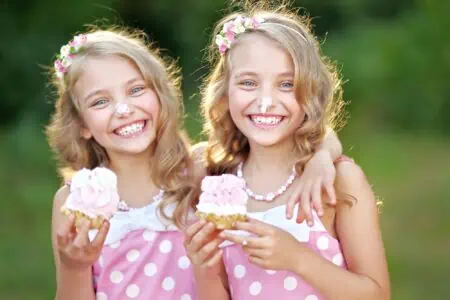 Two twin girls celebrating their birthday