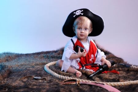 Adorable little boy in pirate costume