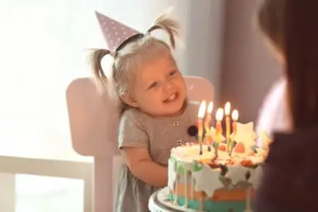 cute toddler celebrating second birthday