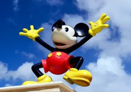 Mickey mouse statue against sky background