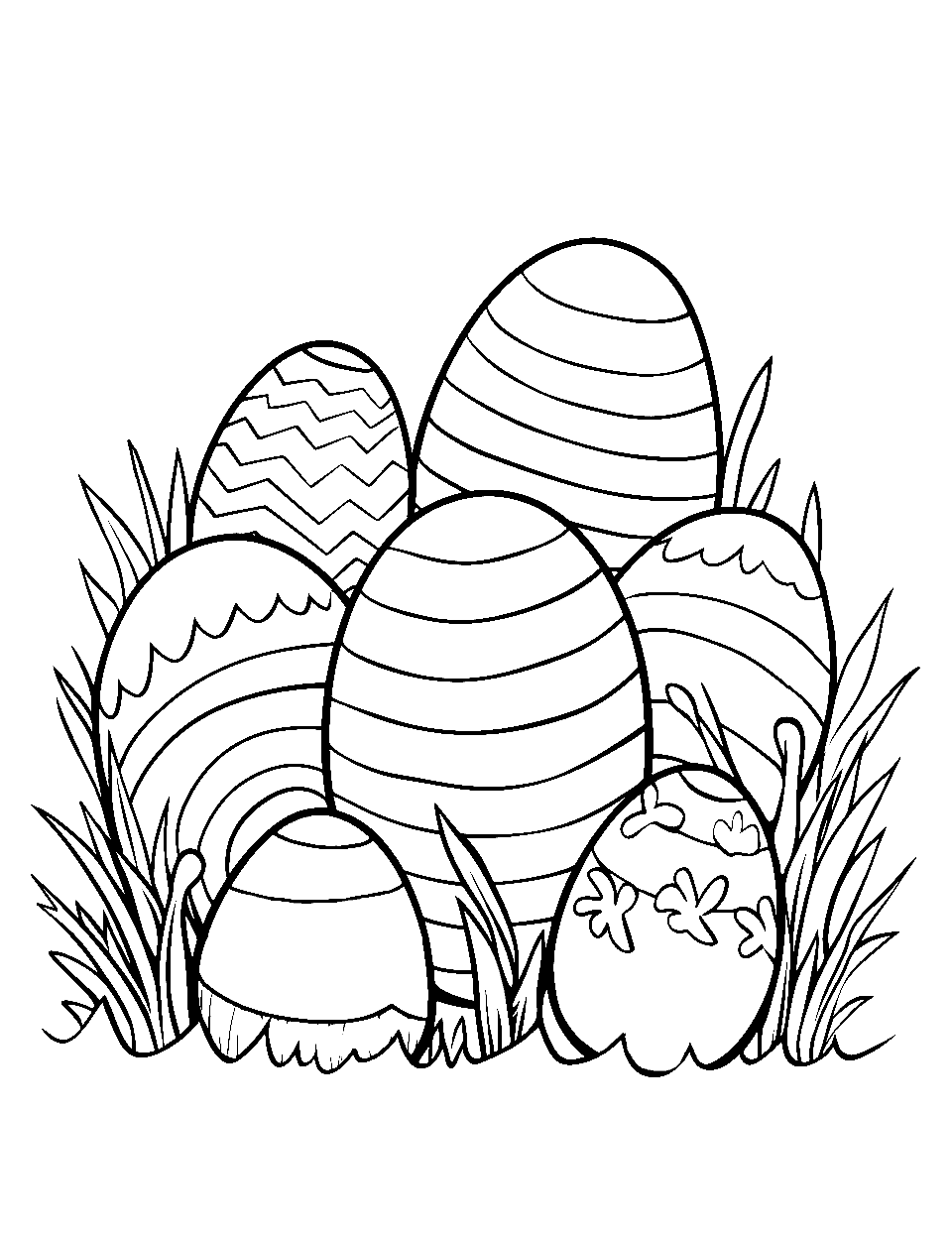 Easter Eggs Preschool Coloring Page - Decorated Easter eggs lying in the grass.