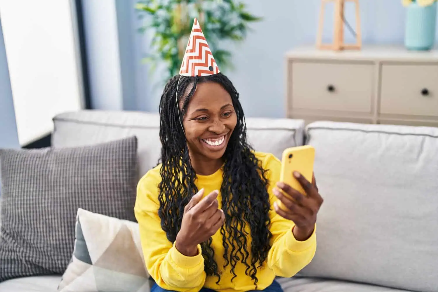 woman celebrating her birthday at home