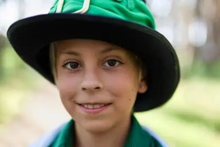 A Celtic boy wearing a traditional Irish hat